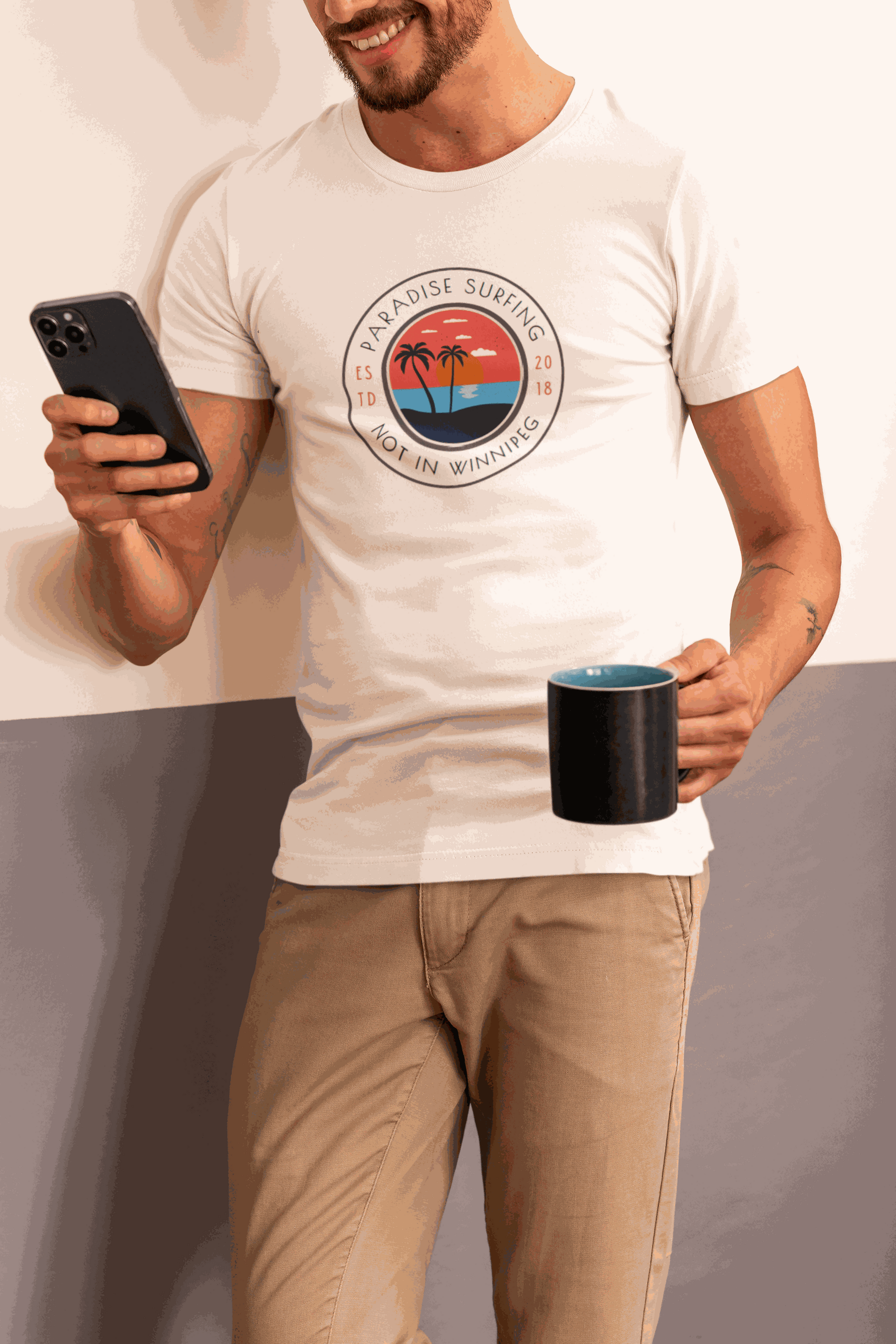 bella-canvas-tee-mockup-of-a-smiling-cropped-face-man-checking-his-phone-m50062