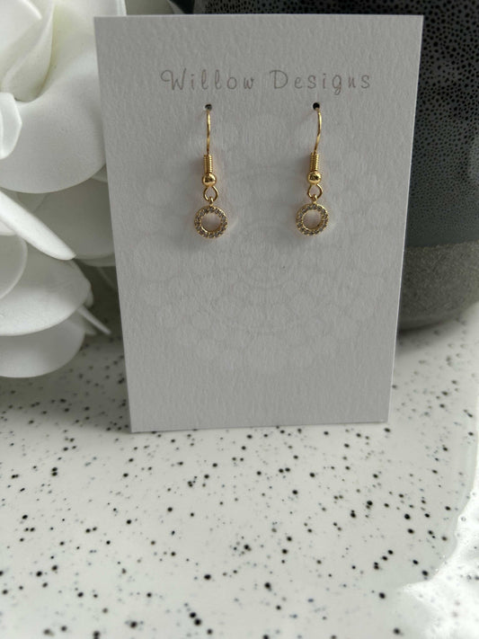 Mini Sparkly Circle Dangly EarringsPretty little sparkly circle dangly earrings. -14K gold plated-hypoallergenic-nickel freeMini Sparkly Circle Dangly EarringsCG Pure Wash